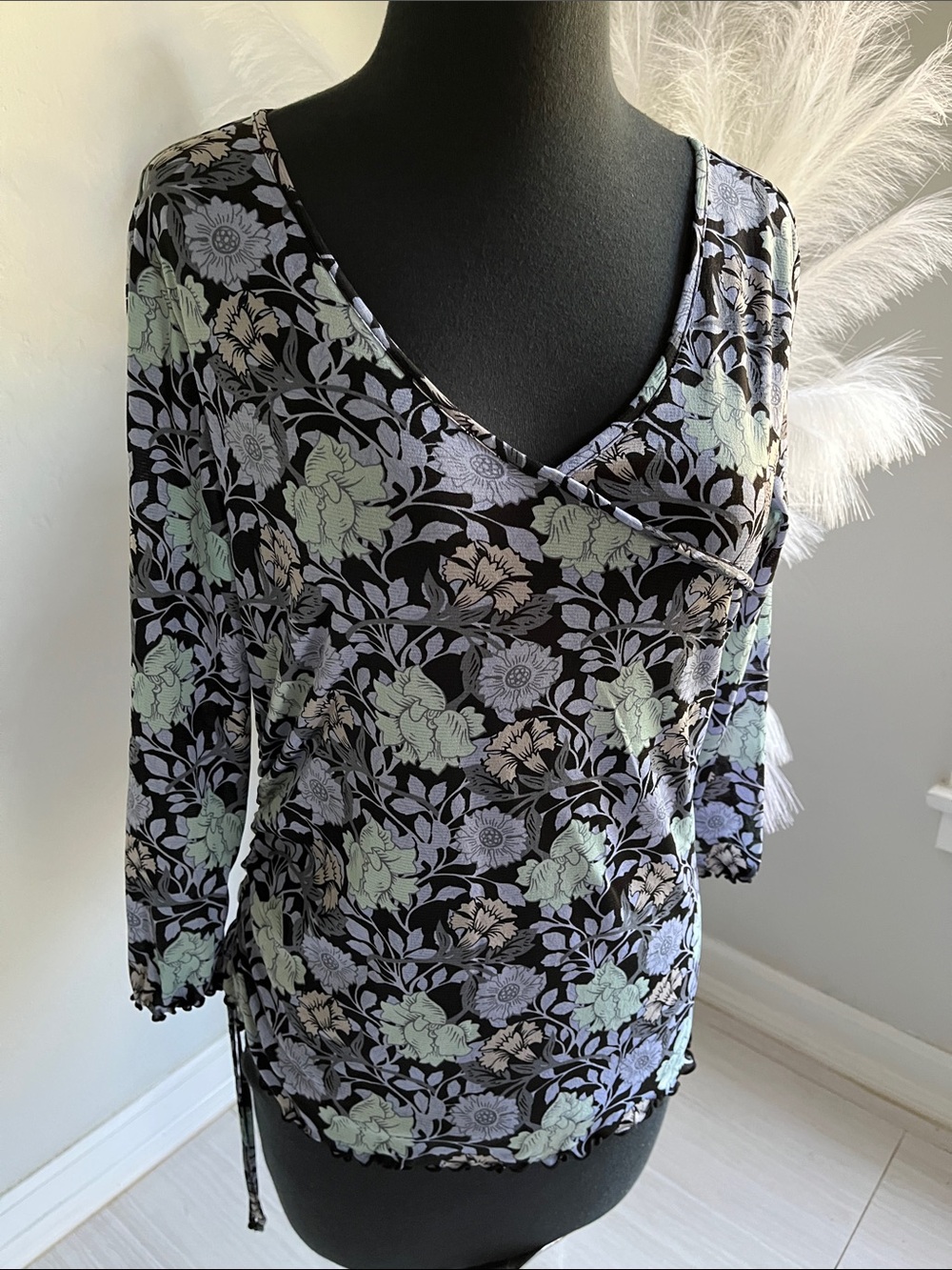 Apostrophe Black Top with Blue and Light Blue Floral Trim